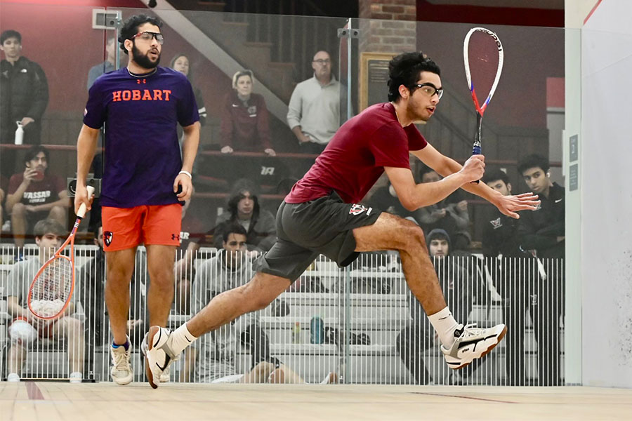 Action shot of Rithik Jalali ’24 with racket in hand.