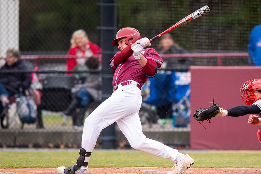 Andrew Kanellis swings at the ball.