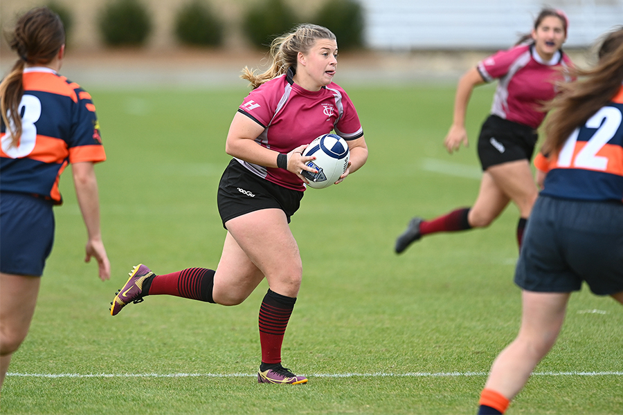 Kasey Drake runs with the ball.