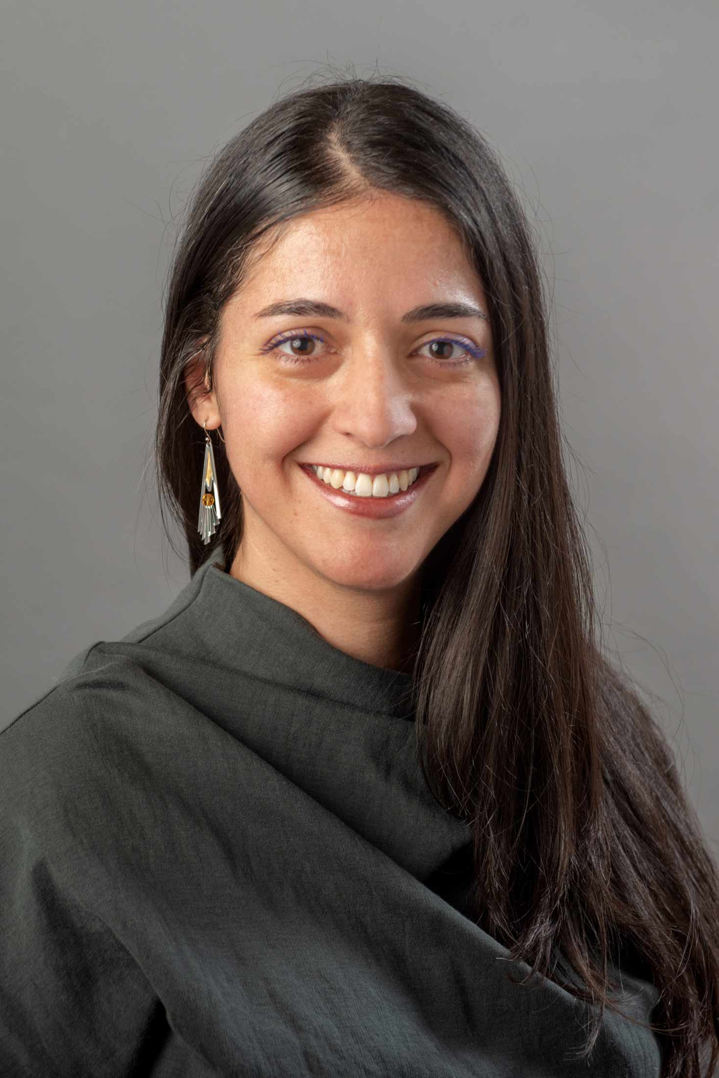 A portrait photo of Tahirih Motazedian.