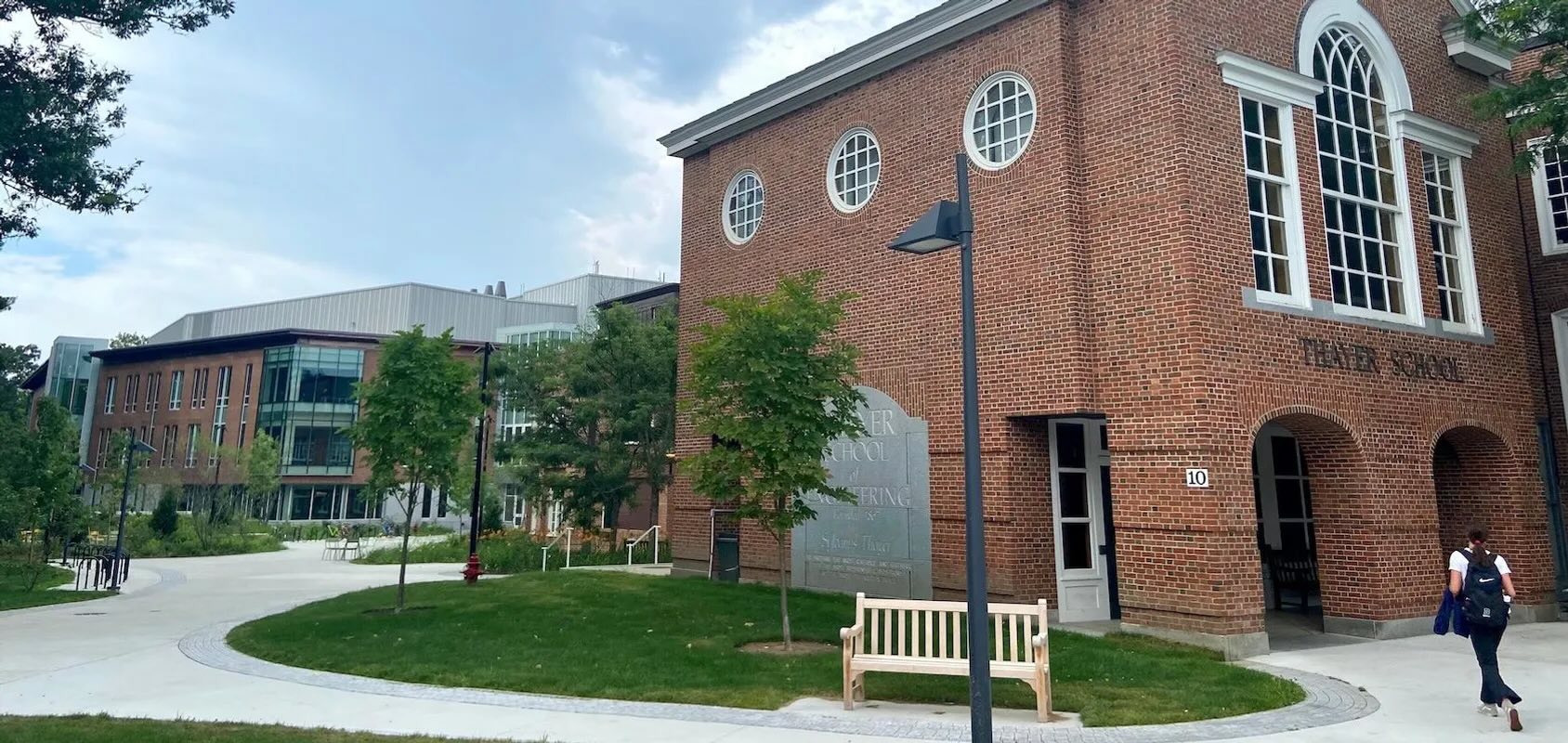 Exterior of a building labeled, "Thayer School."