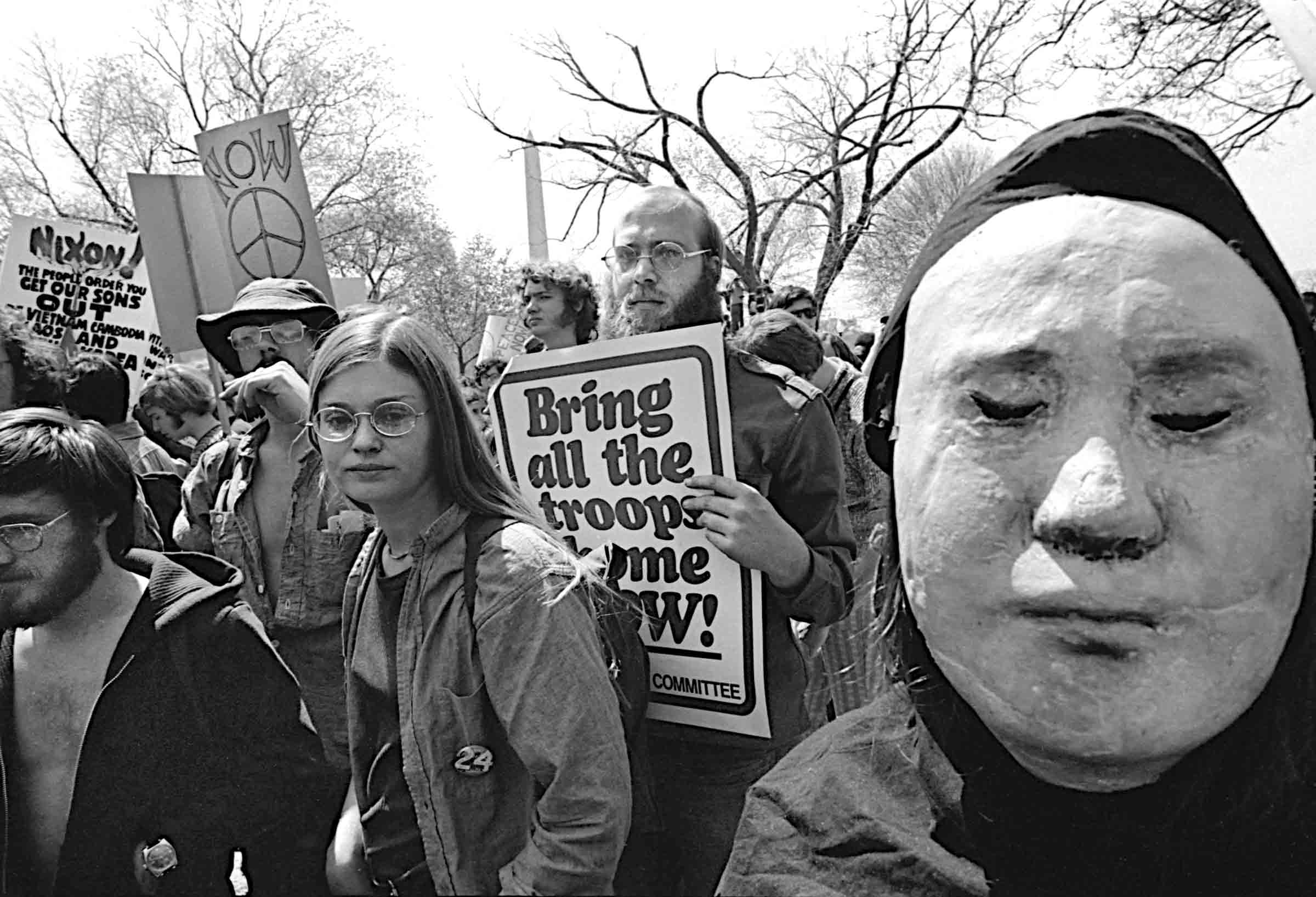 People in an anti-war peace march.