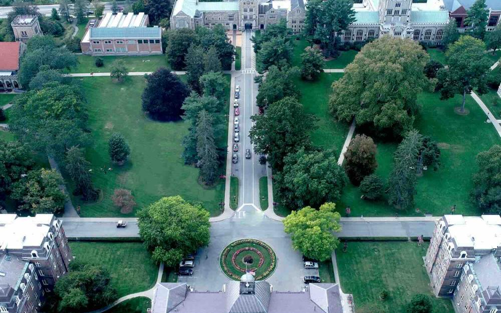 Vassar's rectangular central greensward, designed by J. C. Olmsted; an aerial drone shot taken over Main Building, looking west.