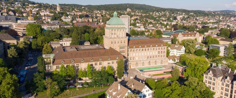 View of the University of Zurich and surrounding city from above.