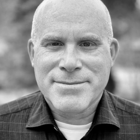 A black-and-white headshot of Jonathan Littman ’85 P’22