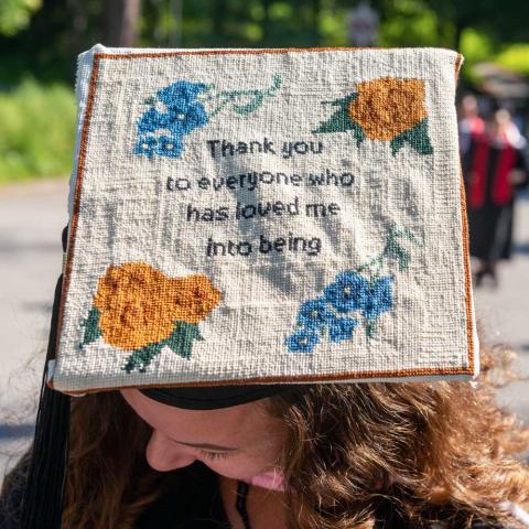 An embroidered sampler with the words "Thank you to everyone who has loved me into being"