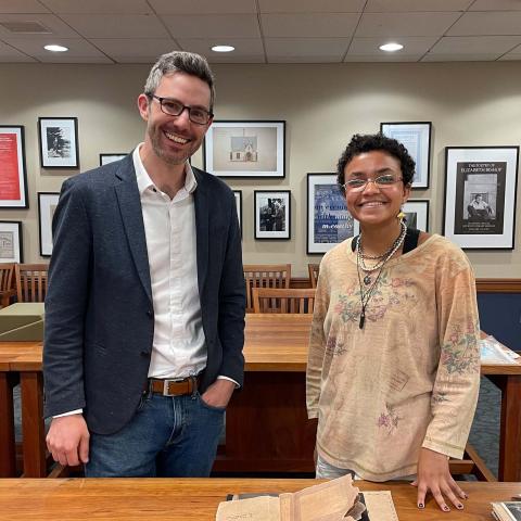 John Murphy, the Loeb’s curator of prints and drawings, and Ford Scholar Carissa Kolcun pose with 11033, an artist’s book that chronicles the story of Mary Morst, who gave birth to twins while she was incarcerated in a Virginia prison in 1913.