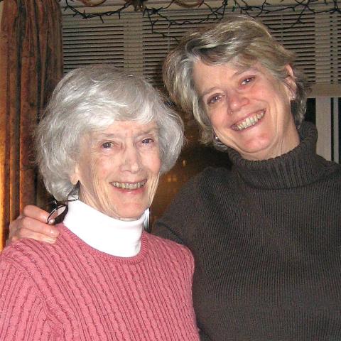 Pictured: Elizabeth “Betty” Gatchell Bouton ’44-45 and her daughter, Katherine Bouton ’69. - Two women standing and smiling for a picture.