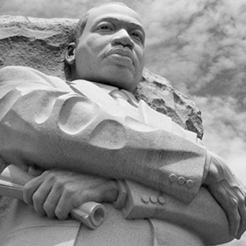 a stone statue of Reverend Dr. Martin Luther King Jr.