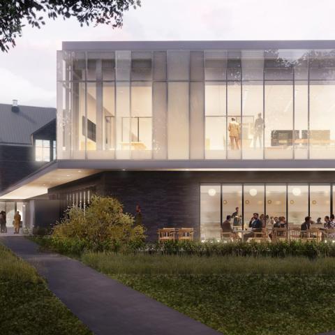 Architectural rendering of an exterior view of a building nestled among trees at dusk with lights on.